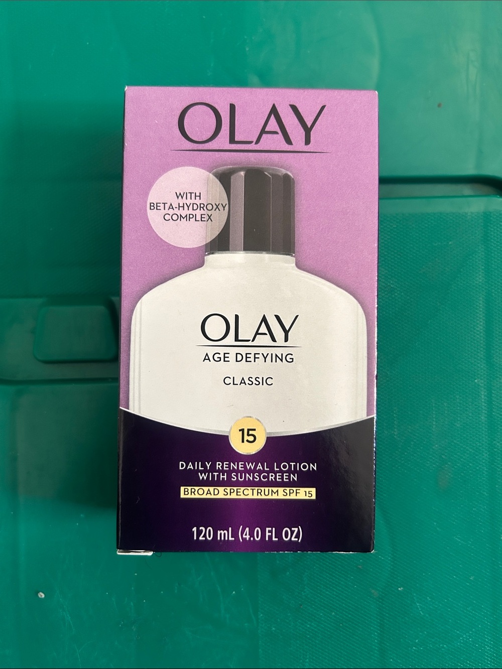 OLAY Age Defying Classic Daily Renewal Lotion - White, Purple, Black